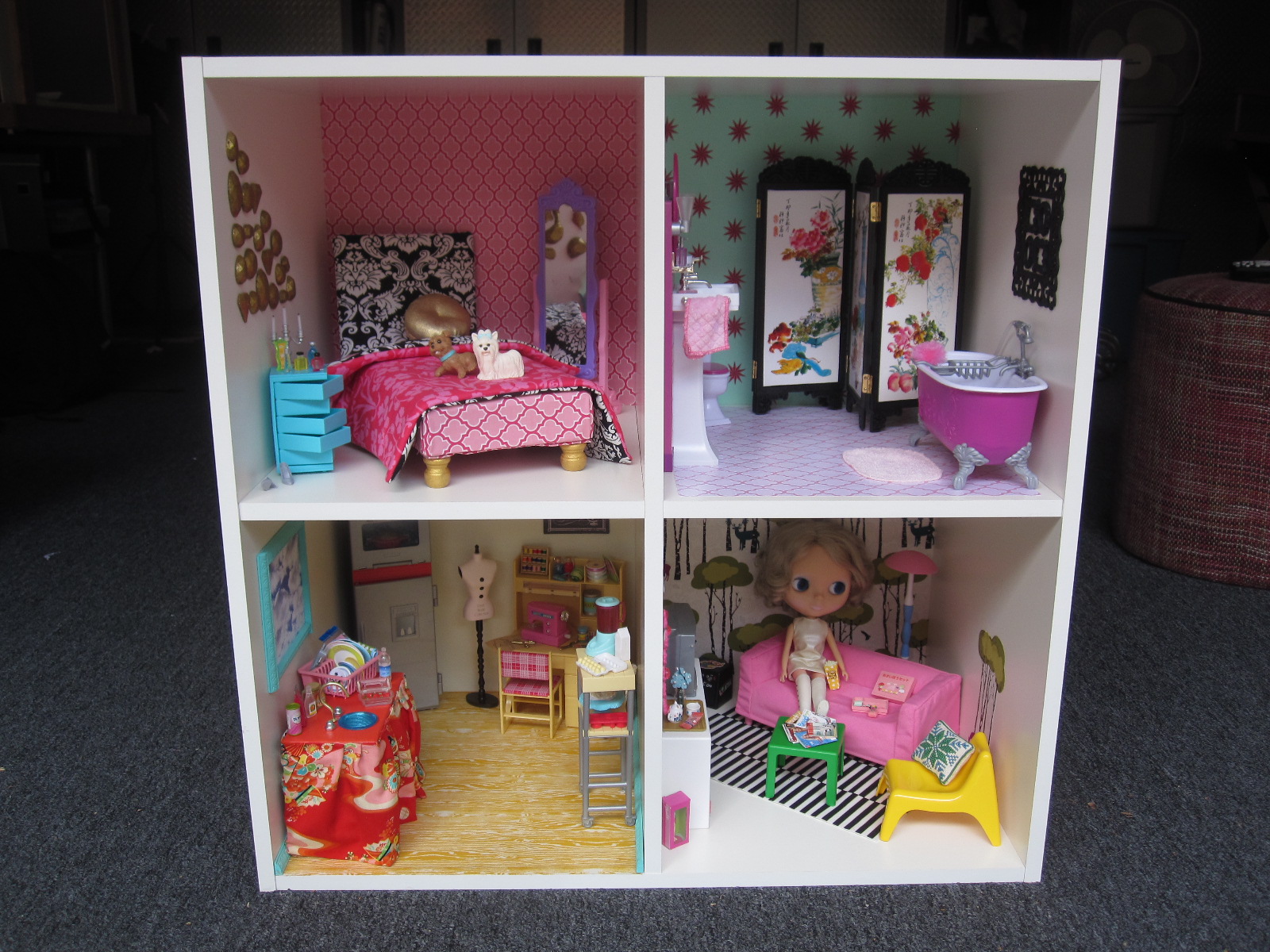 dollhouse made out of bookshelf